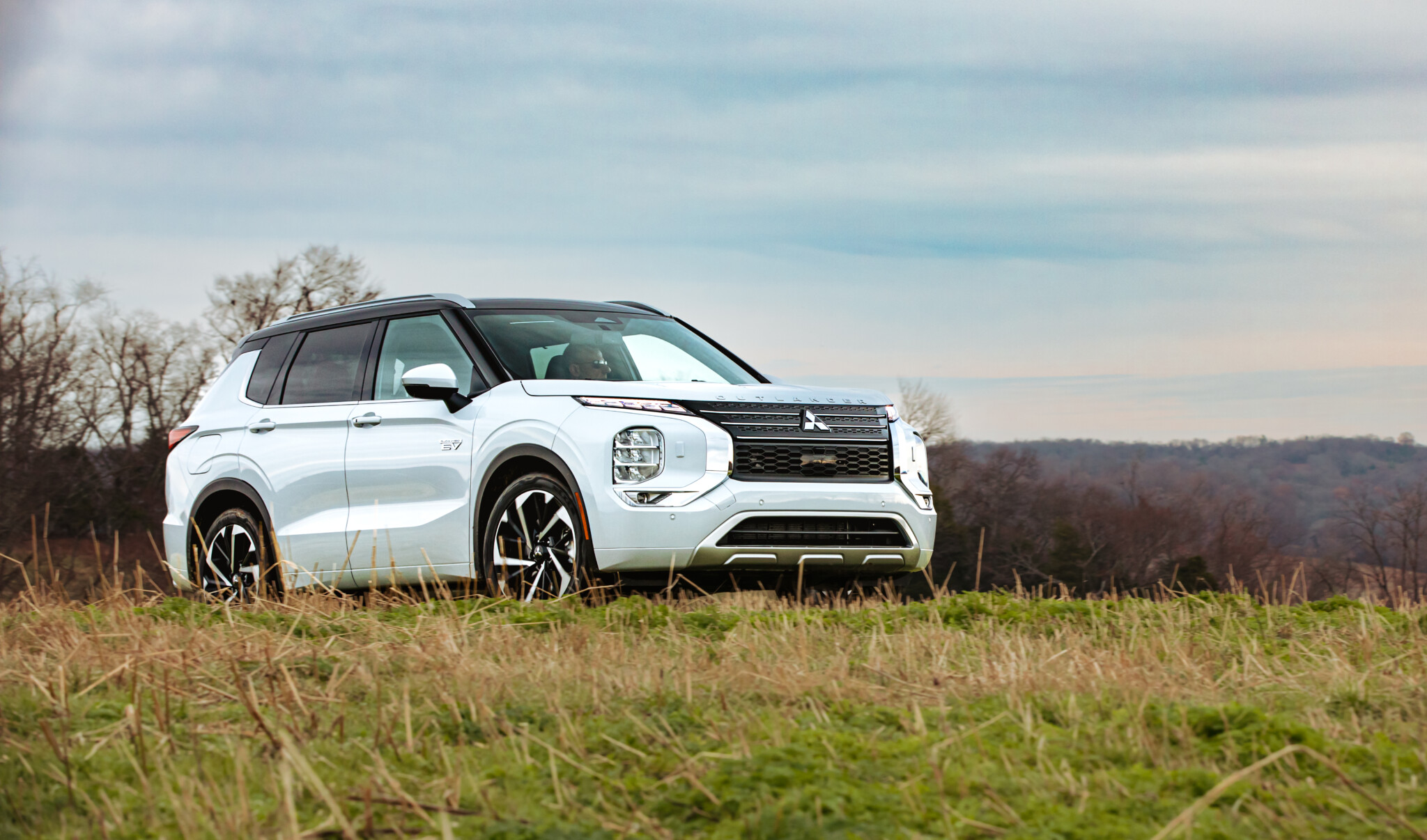 Mitsubishi outlander 2024 2025. Новый Митсубиси Аутлендер 2023. Митсубиси Outlander 2023. Митсубиши Аутлендер 2024. Mitsubishi Outlander 2024.